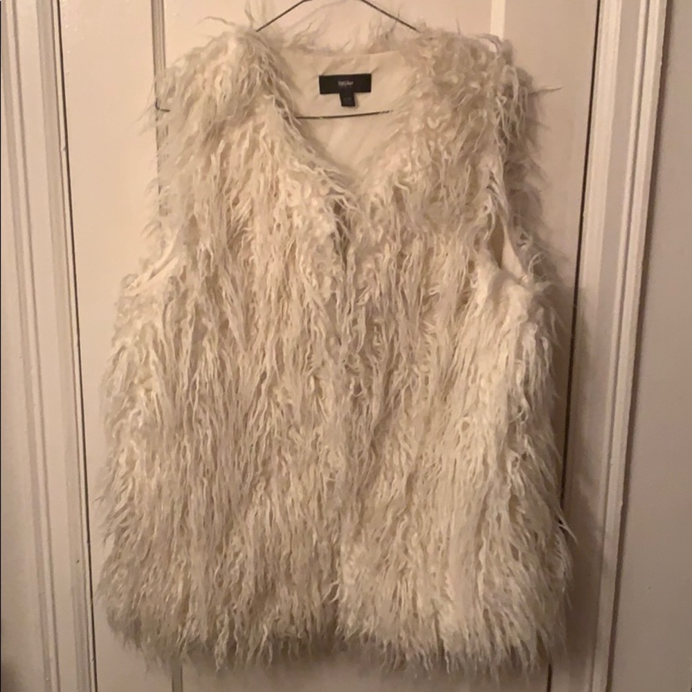 Faux fur vest.